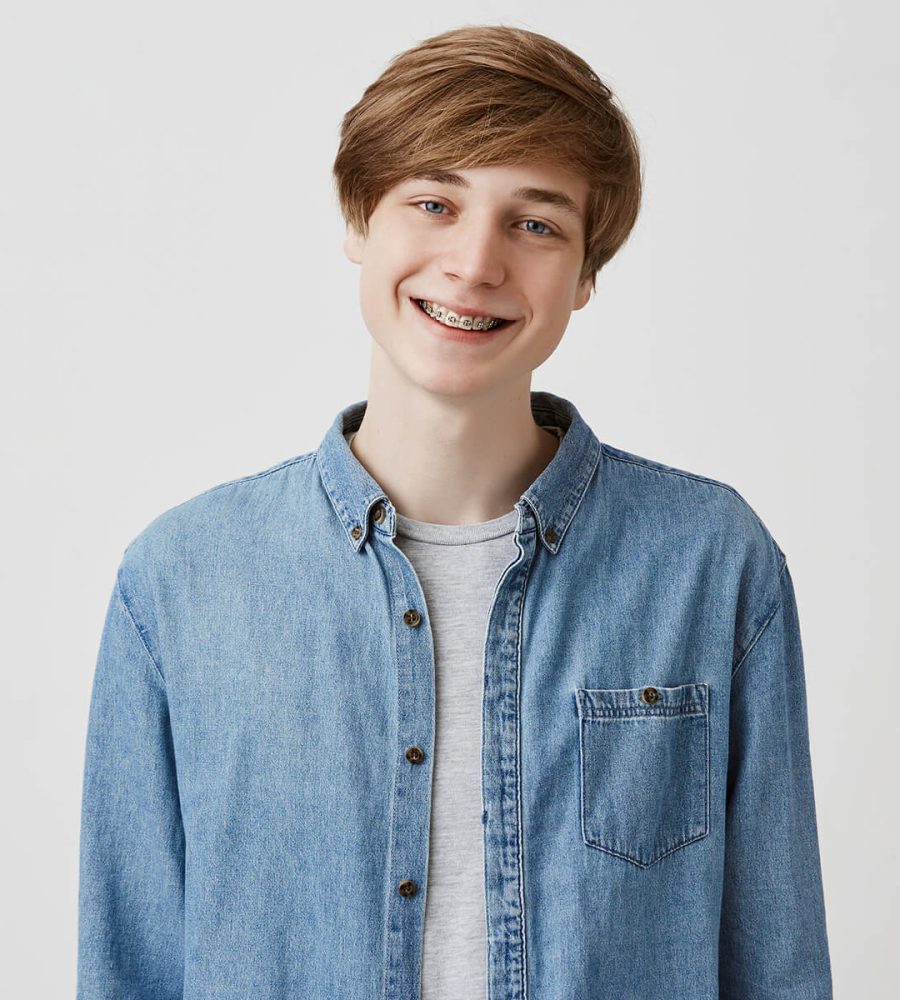happy-young-european-man-with-fair-hair-and-blue-e-E7C8J8M.jpg