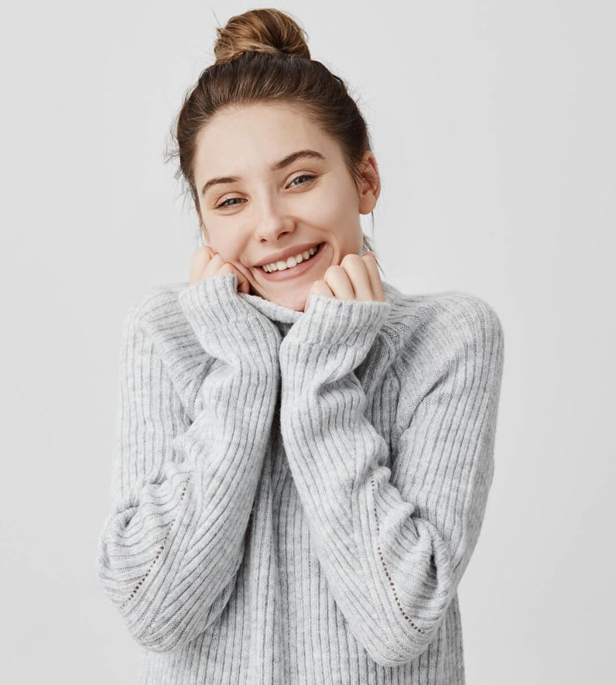 headshot-of-adorable-smiling-woman-wrapping-up-her-HNGC7QB.jpg